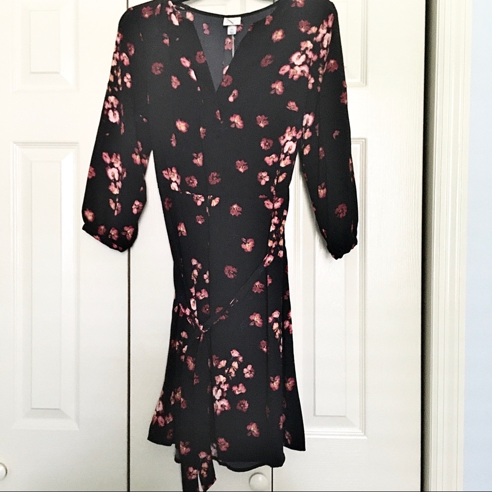 Fall dress with tie and floral pattern